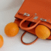 O Laranja da Hermès: Como uma Cor se Tornou Ícone de Luxo no Mundo da Moda